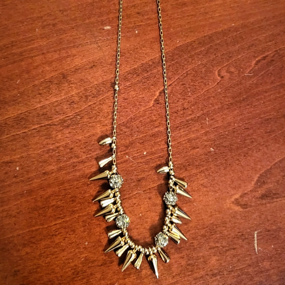 Costume gold necklace with spike detail
